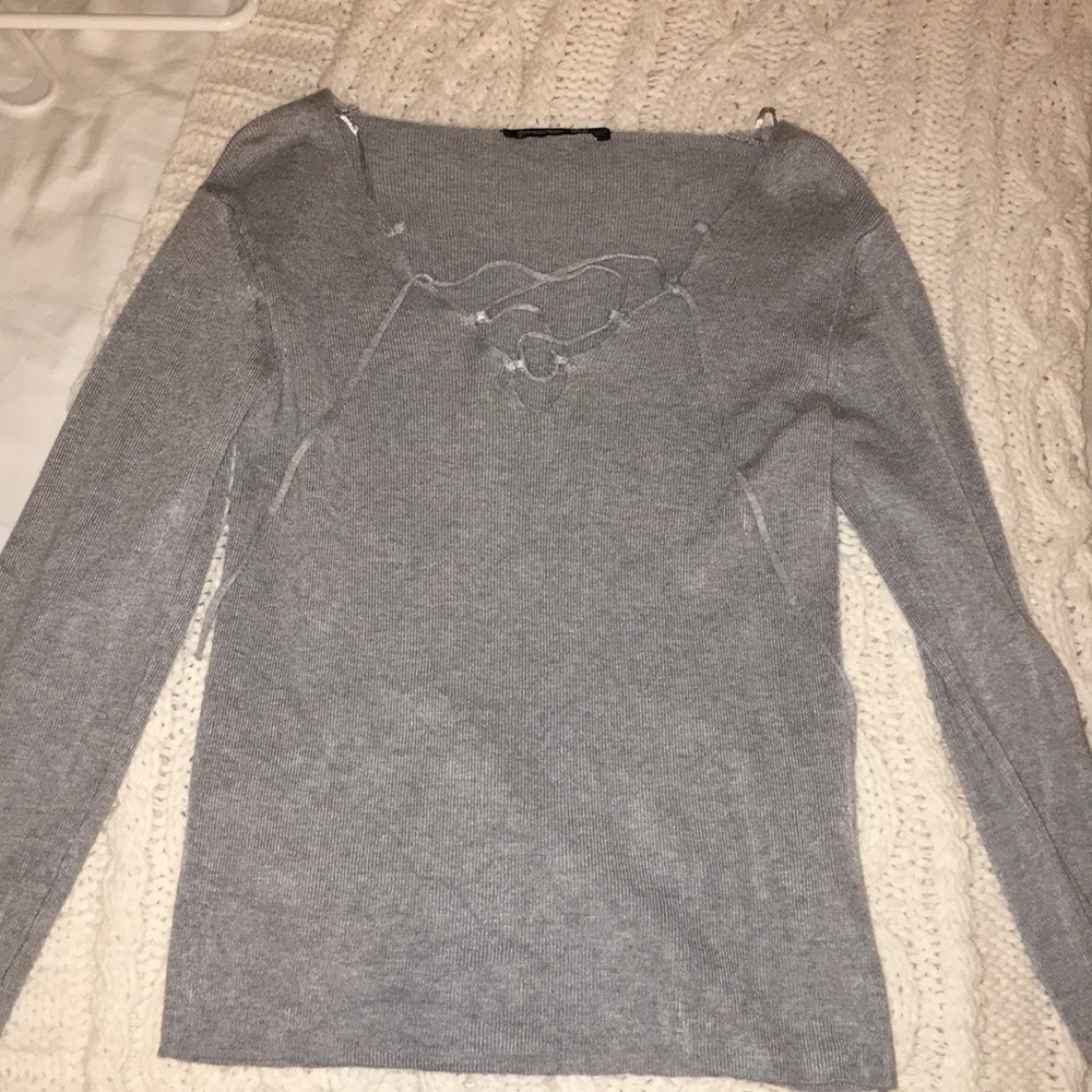 long sleeve shirt with cross cross front cut out